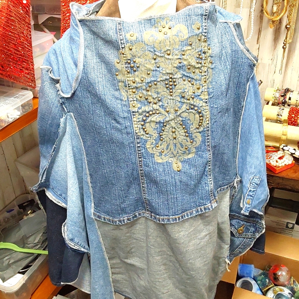Handmade poncho, made with jean scraps and embroidery pieces.Large to xx large